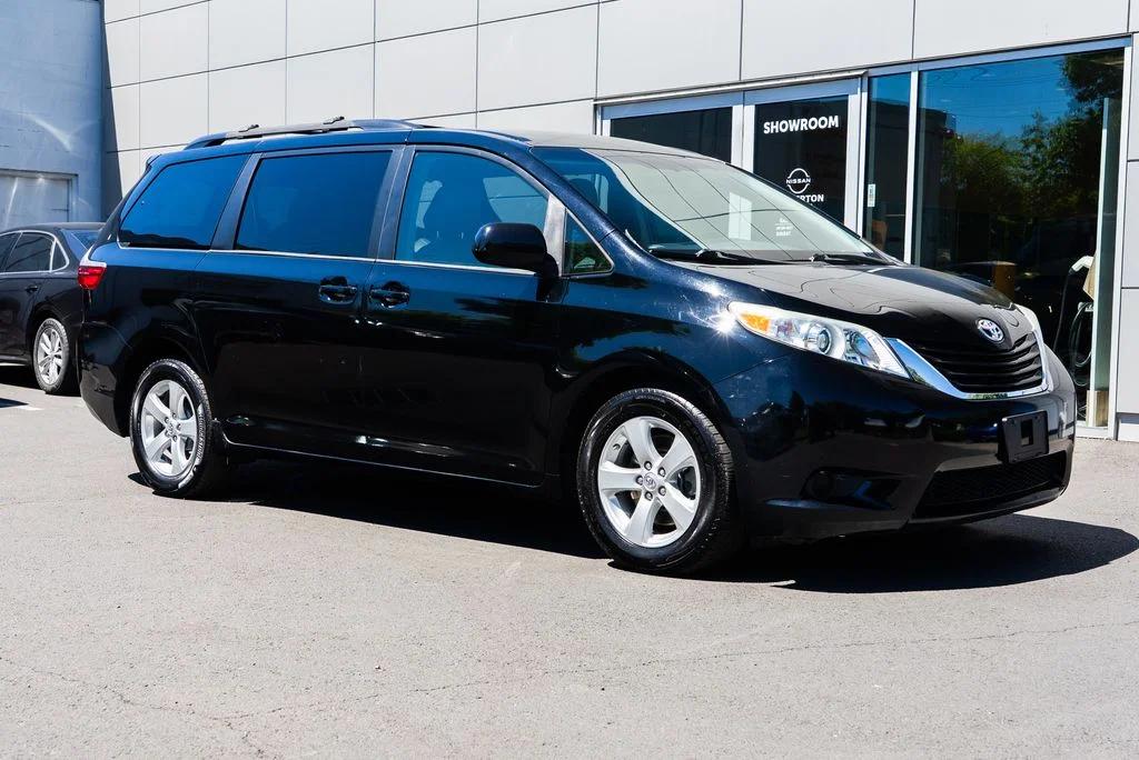 Used 2015 Black Toyota LE image 1
