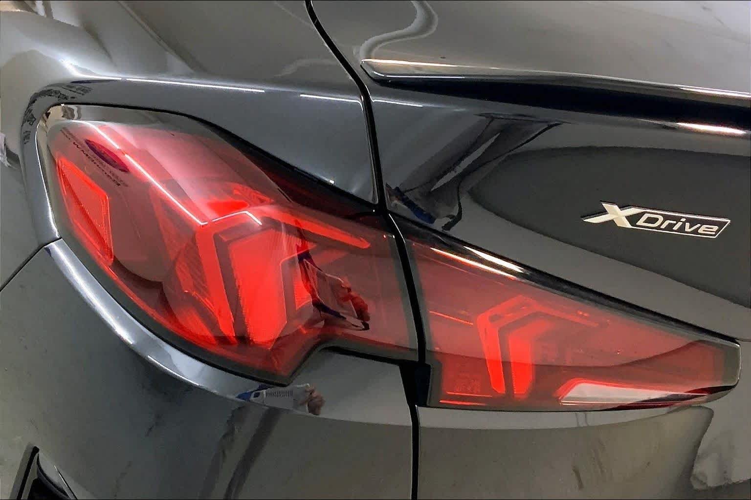 Used 2025 Black Sapphire Metallic BMW 228 xDrive image 28