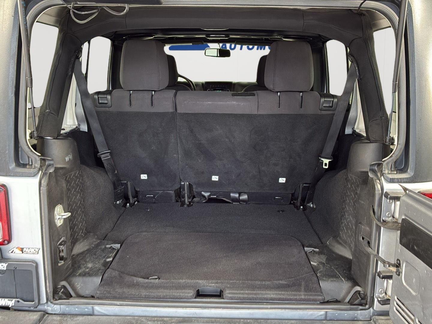 Used 2013 Billet Silver Metallic Jeep Sport image 8