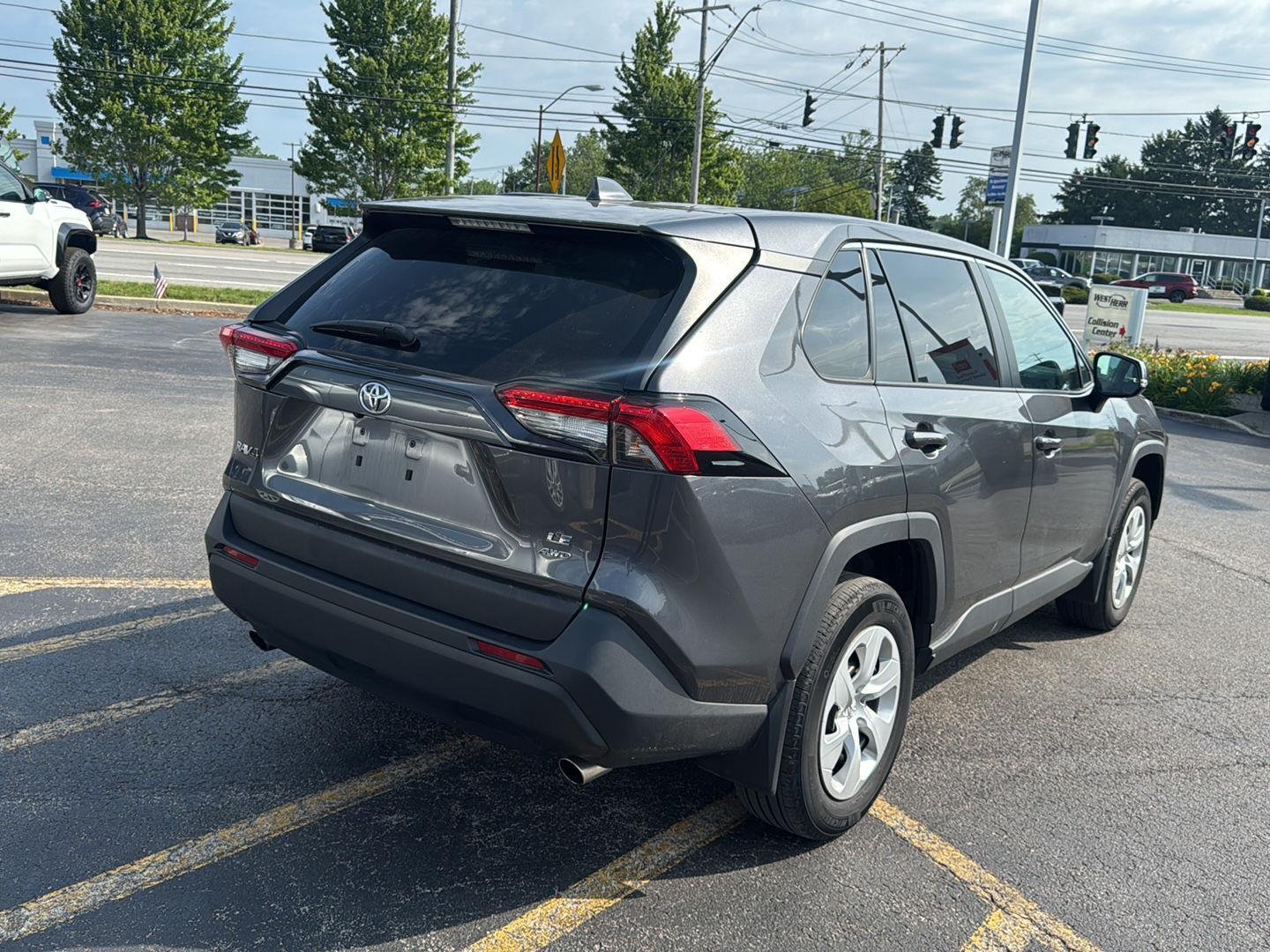 Used 2023 Magnetic Gray Metallic Toyota LE image 6