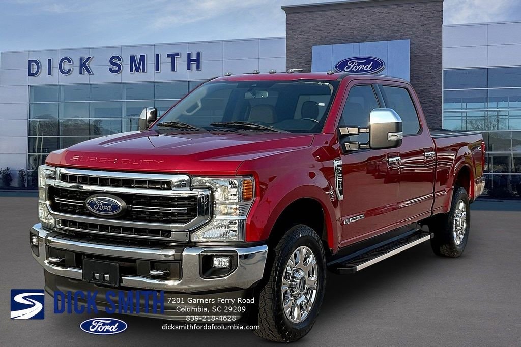 Certified Used 2022 Red Metallic Ford Lariat image 1