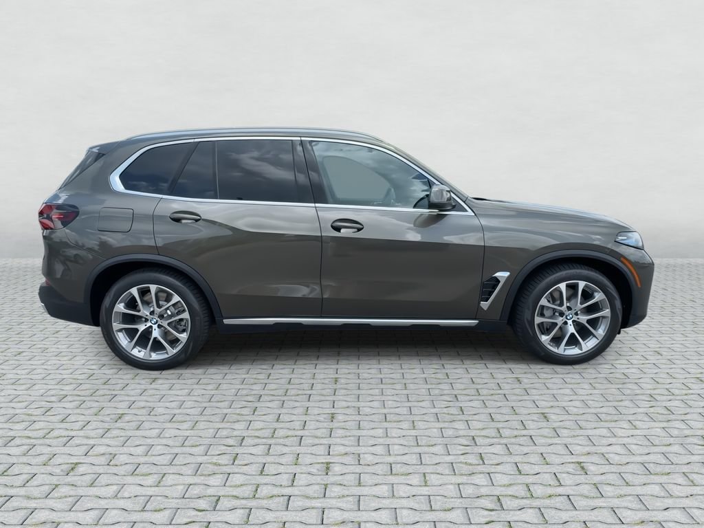 New 2026 Manhattan Green Metallic BMW xDrive50e image 9