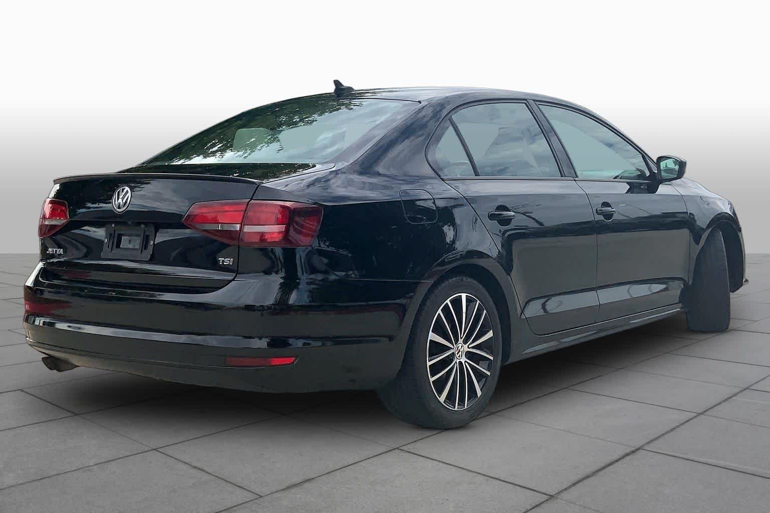Used 2016 Black Uni Volkswagen 1.8T Sport image 13