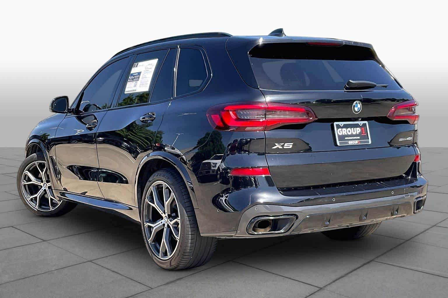 Used 2021 Black Sapphire Metallic BMW sDrive40i image 11