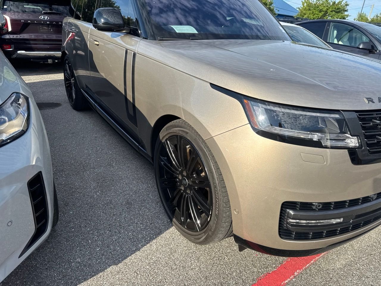 Used 2023 Gold Land Rover SE image 4