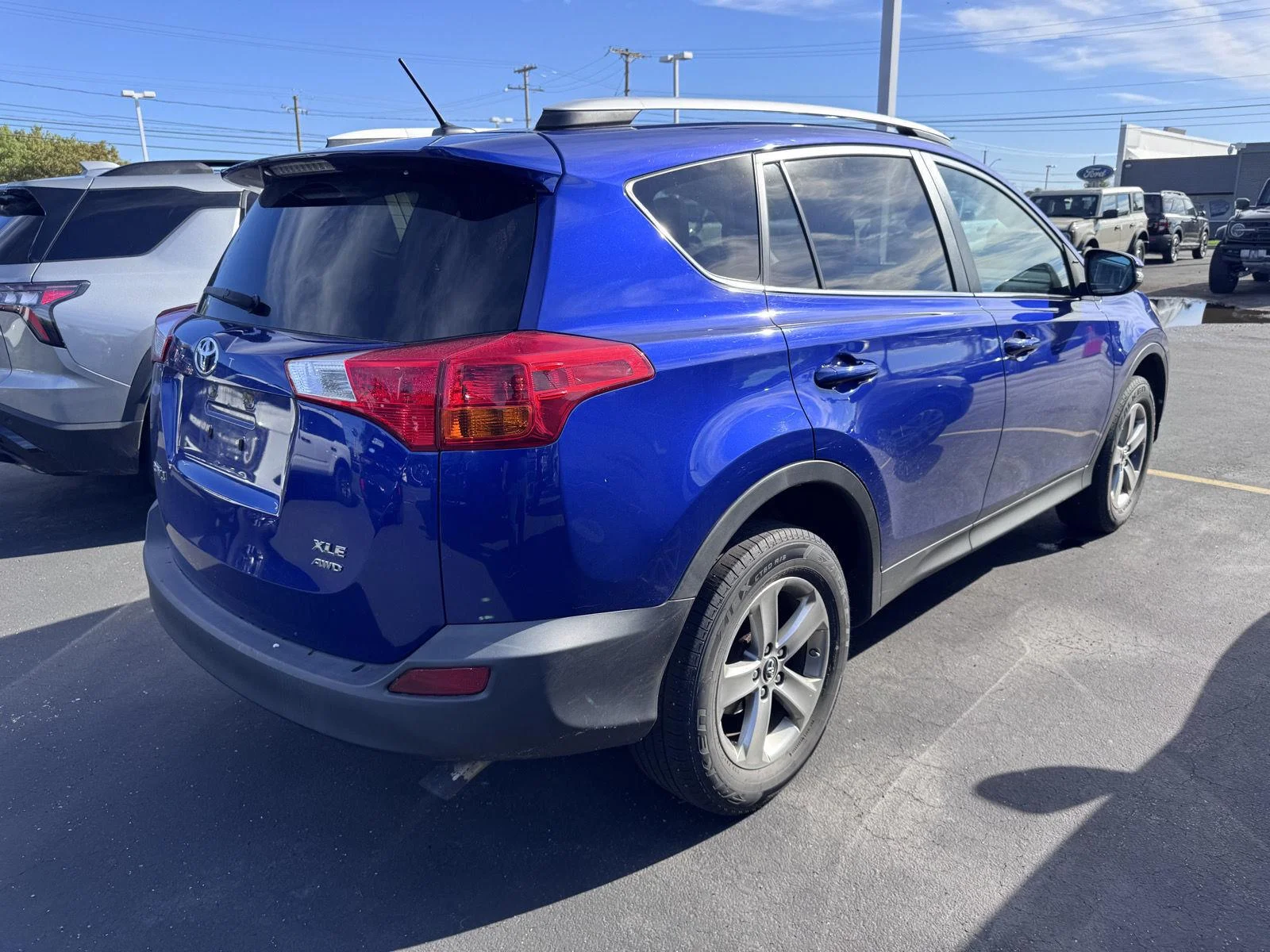 Used 2015 Blue Crush Metallic Toyota XLE image 3
