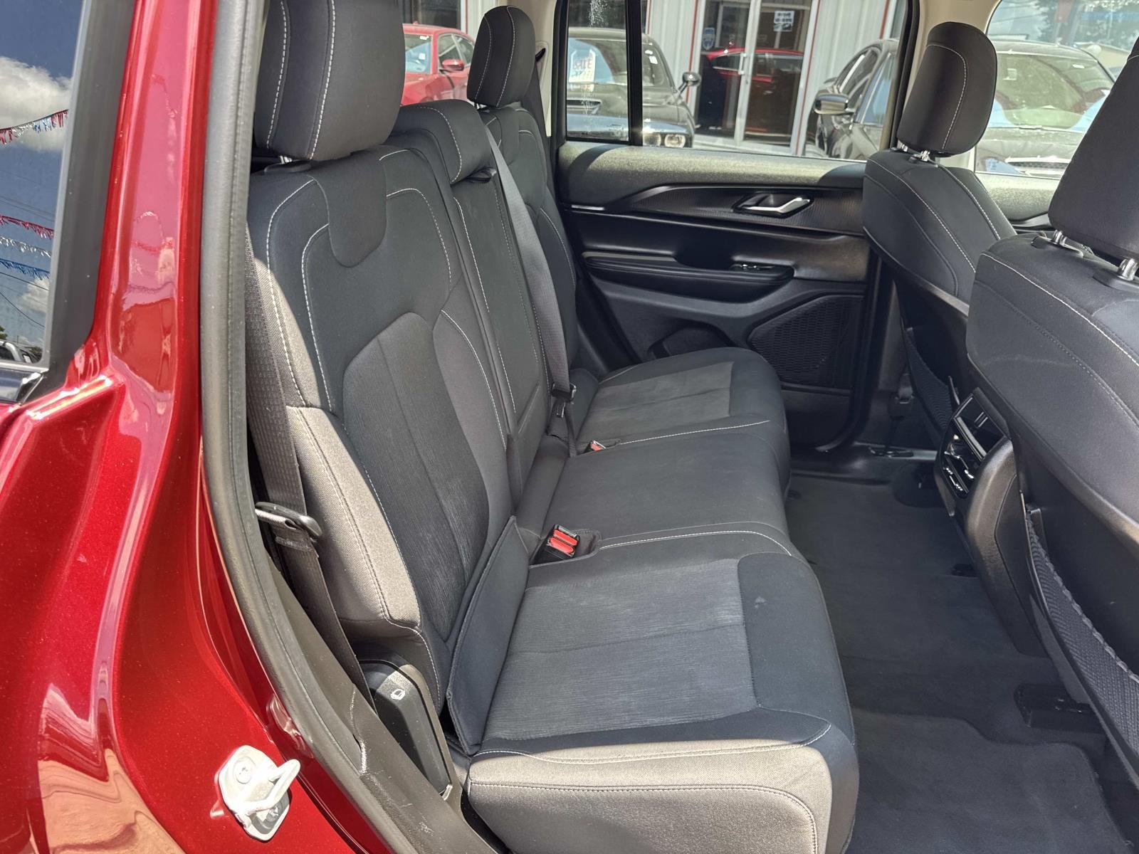 Used 2024 Velvet Red Pearlcoat Jeep Laredo image 9