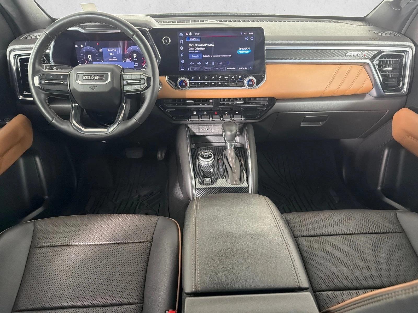 Used 2024 Sterling Metallic GMC 4WD AT4 image 22