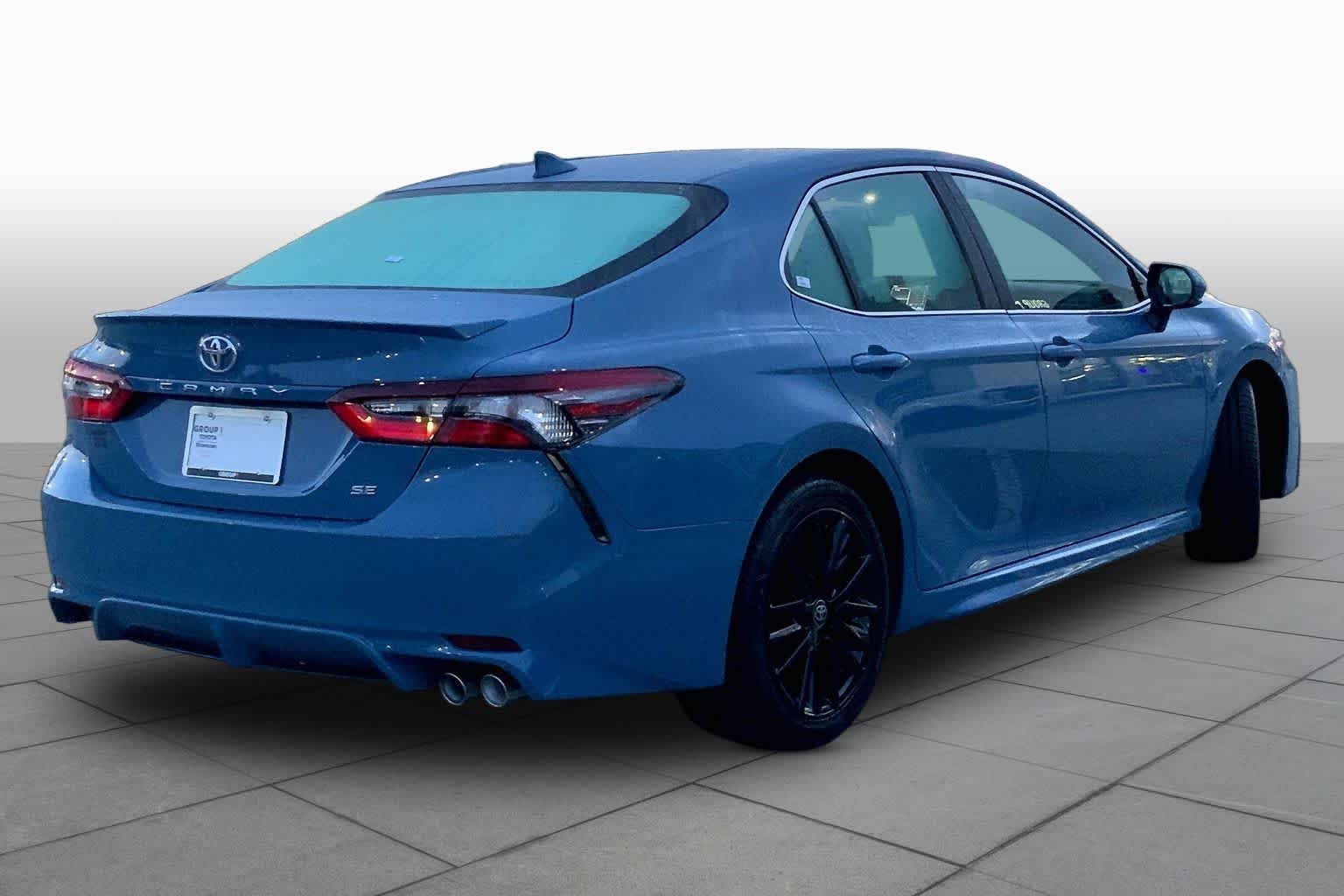 Used 2024 Cavalry Blue Toyota SE image 13