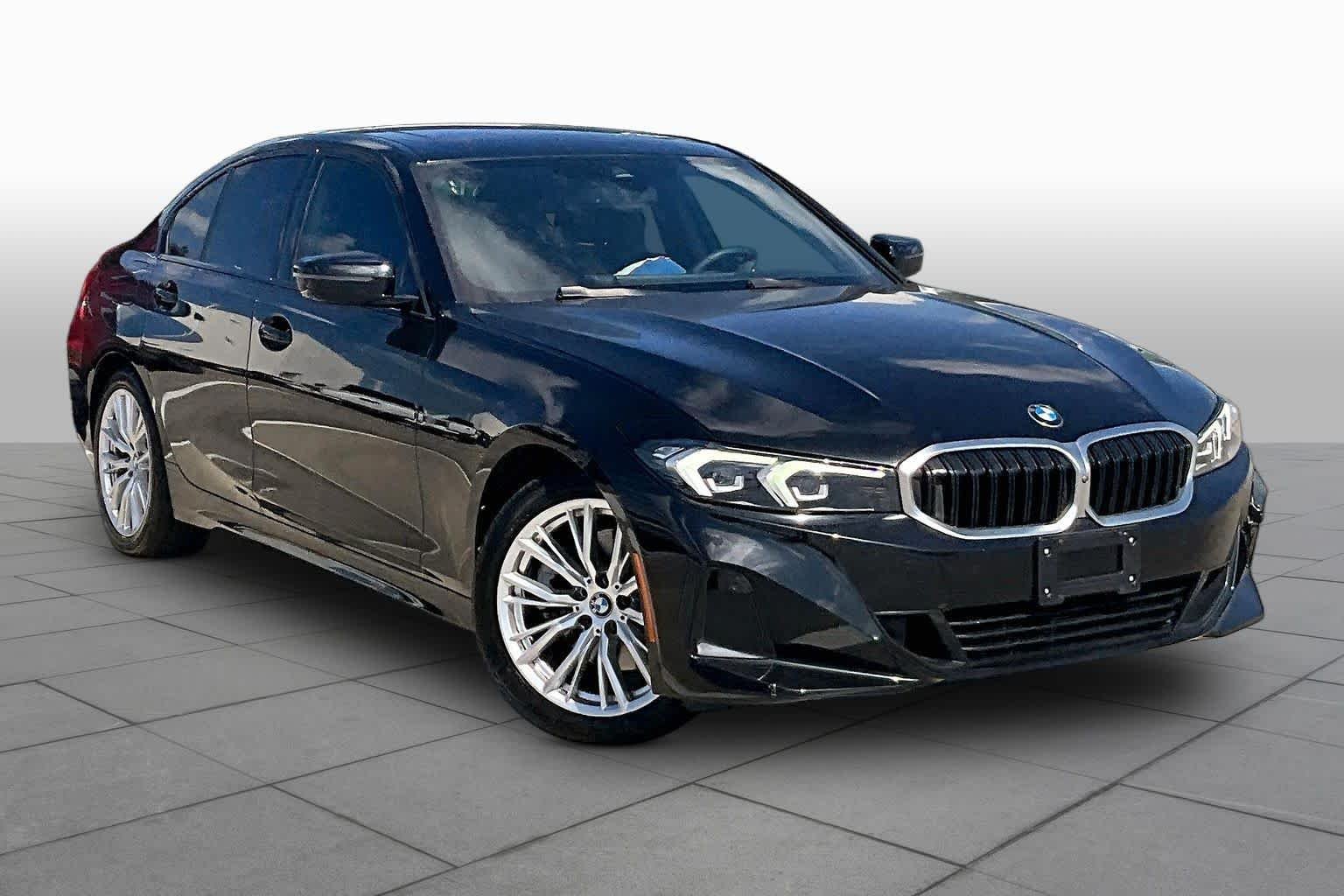 Used 2023 Black Sapphire Metallic BMW 330i image 2