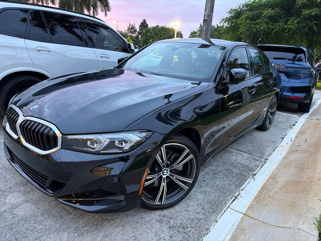 Certified Used 2023 Black Sapphire Metallic BMW 330i image 1