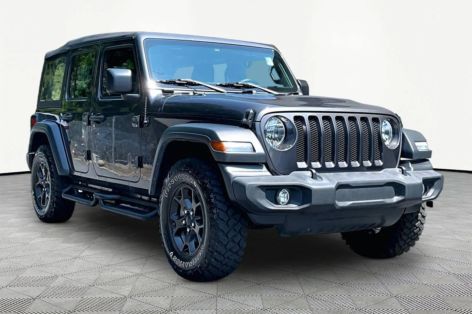 Used 2023 Granite Crystal Metallic Clearcoat Jeep Sport image 3