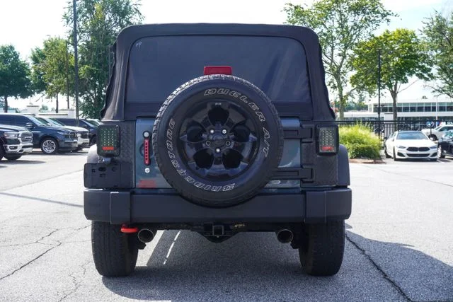 Used 2014 Gray Jeep Unlimited Sport image 12