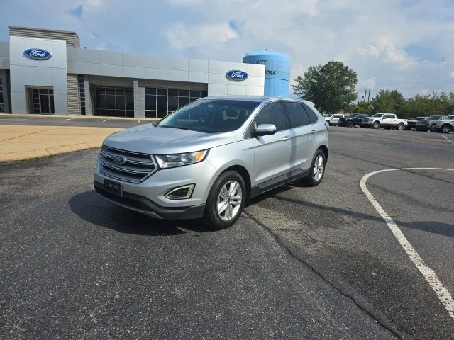 Used 2015 Ingot Silver Ford SEL image 7