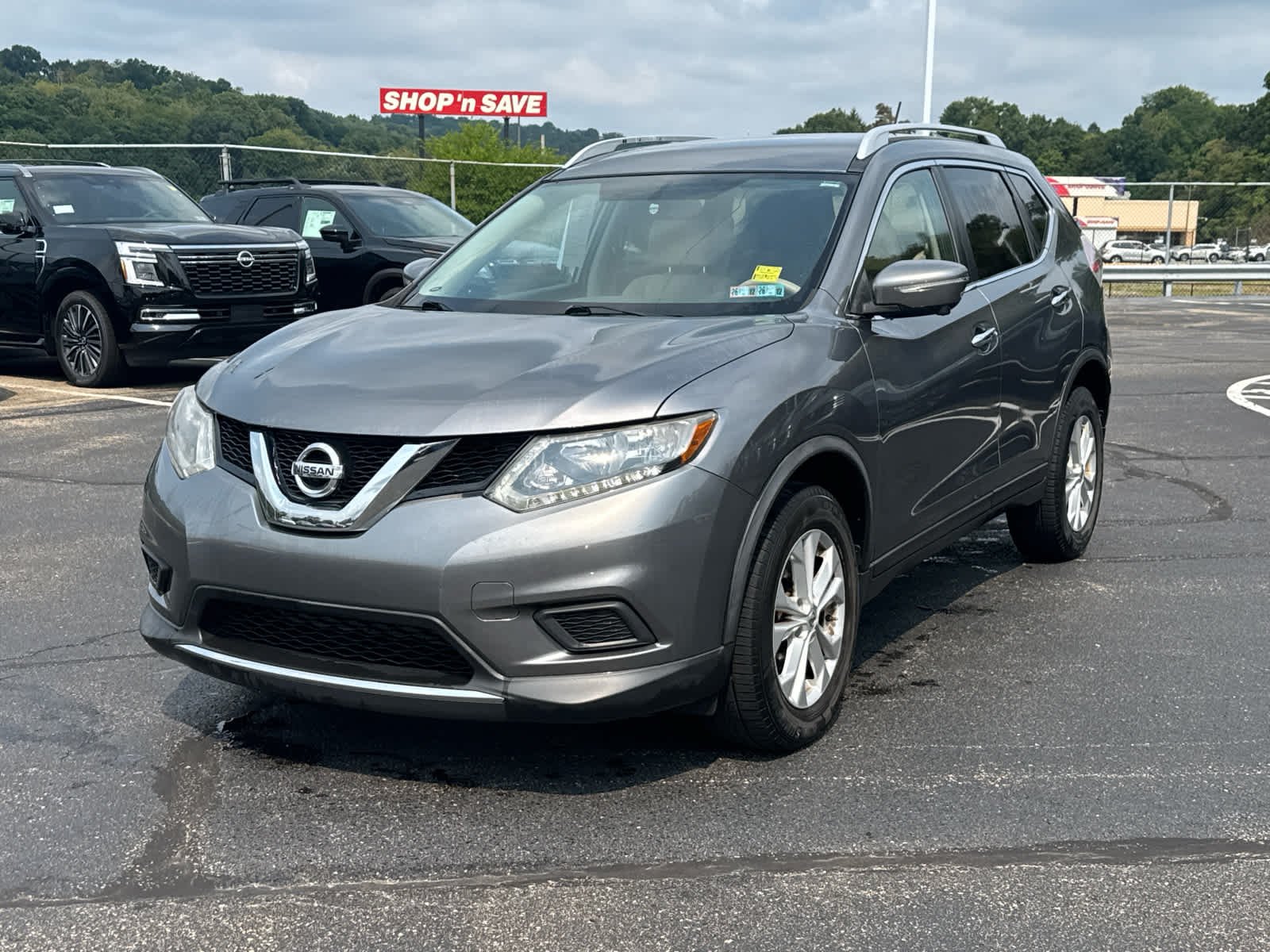 Used 2015 Gun Metallic Nissan SV image 2