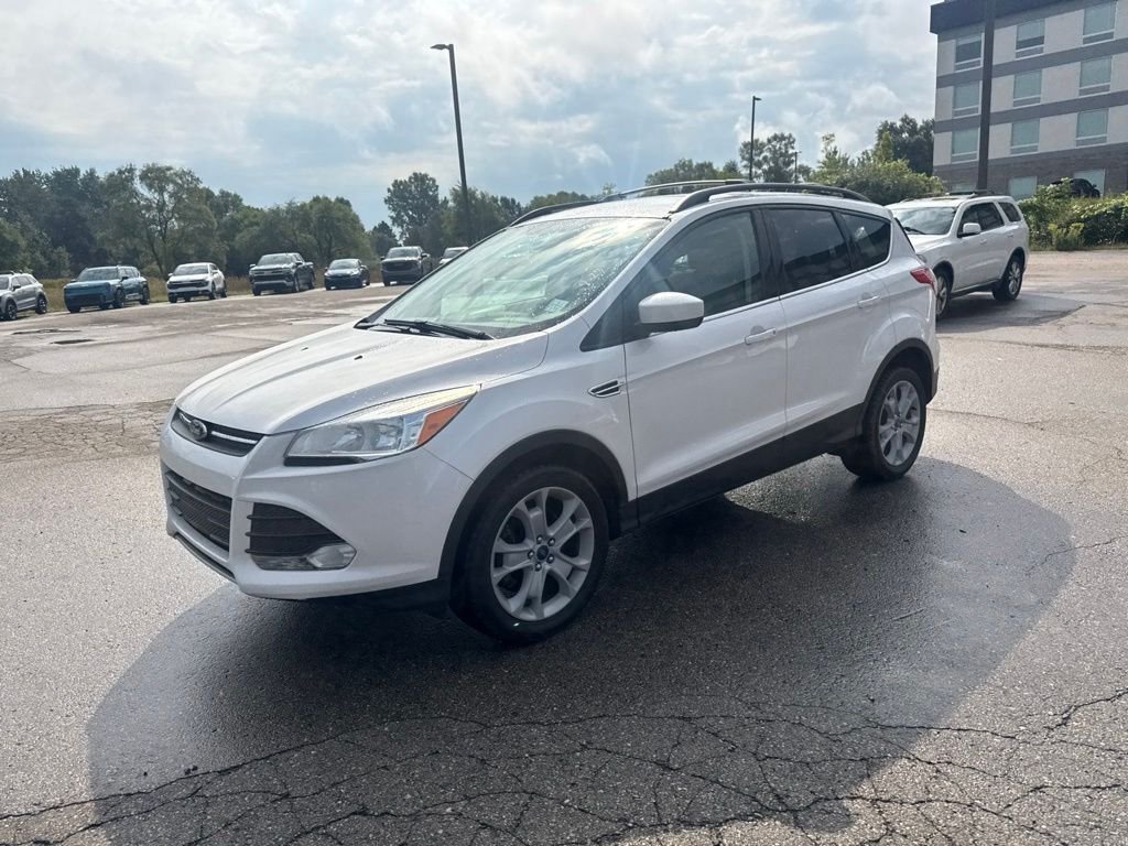 Used 2013 White Platinum Ford SE image 4