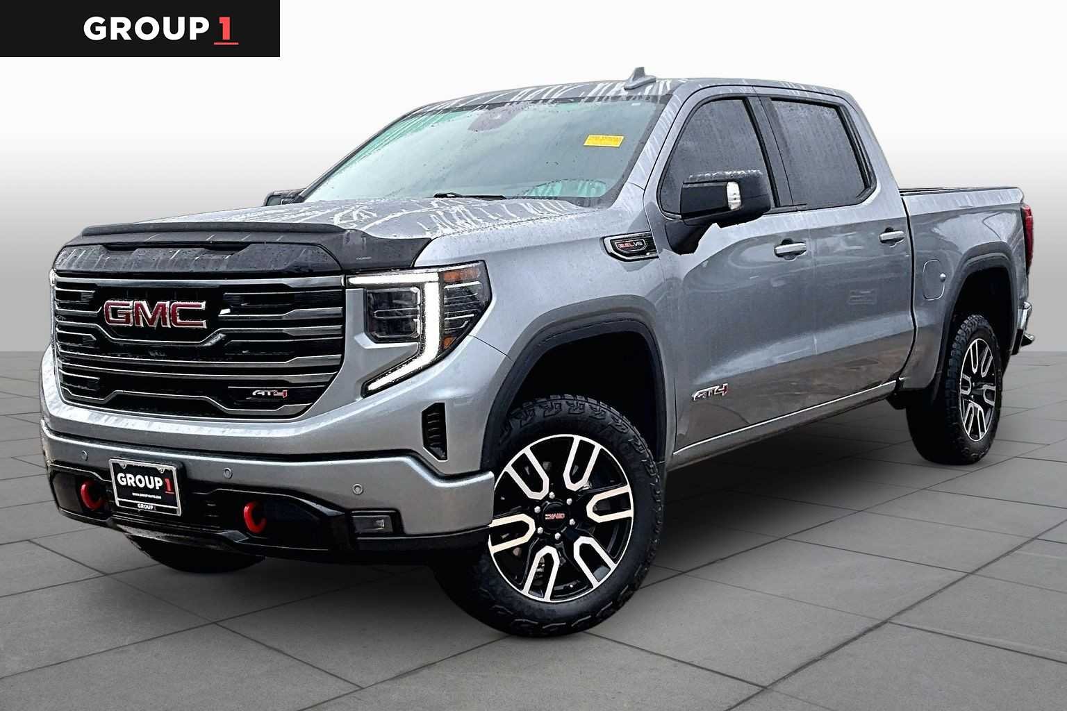 Used 2025 Sterling Metallic GMC AT4 image 1