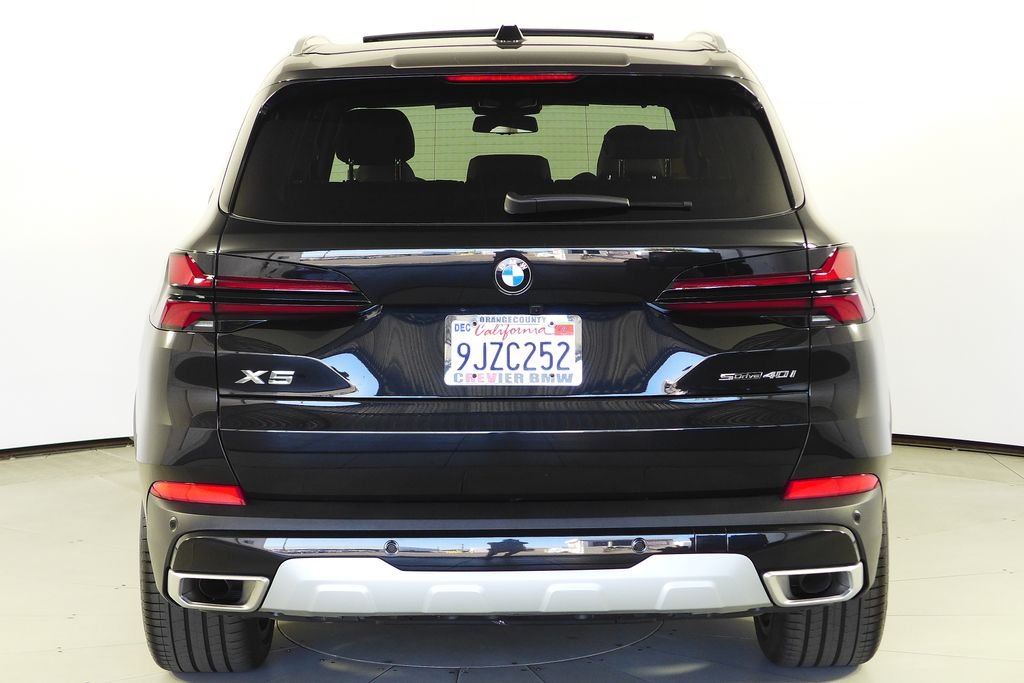 Certified Used 2024 Black Sapphire Metallic BMW sDrive40i image 8