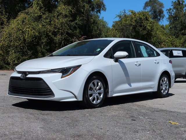 Used 2024 White Toyota LE image 1