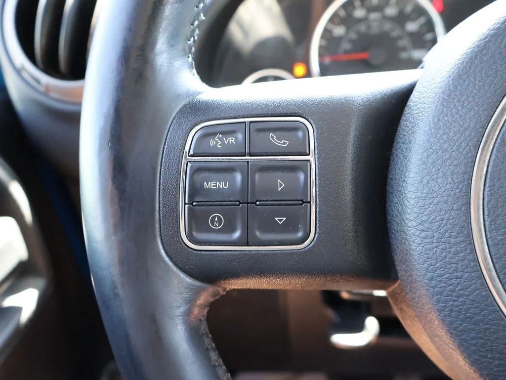 Used 2014 Blue Jeep Unlimited Sport image 25