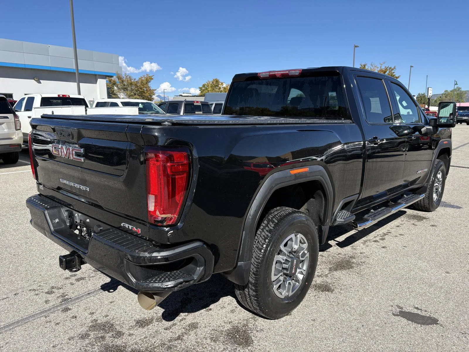 Used 2023 EBONY TWILIGHT METALLIC GMC AT4 image 3
