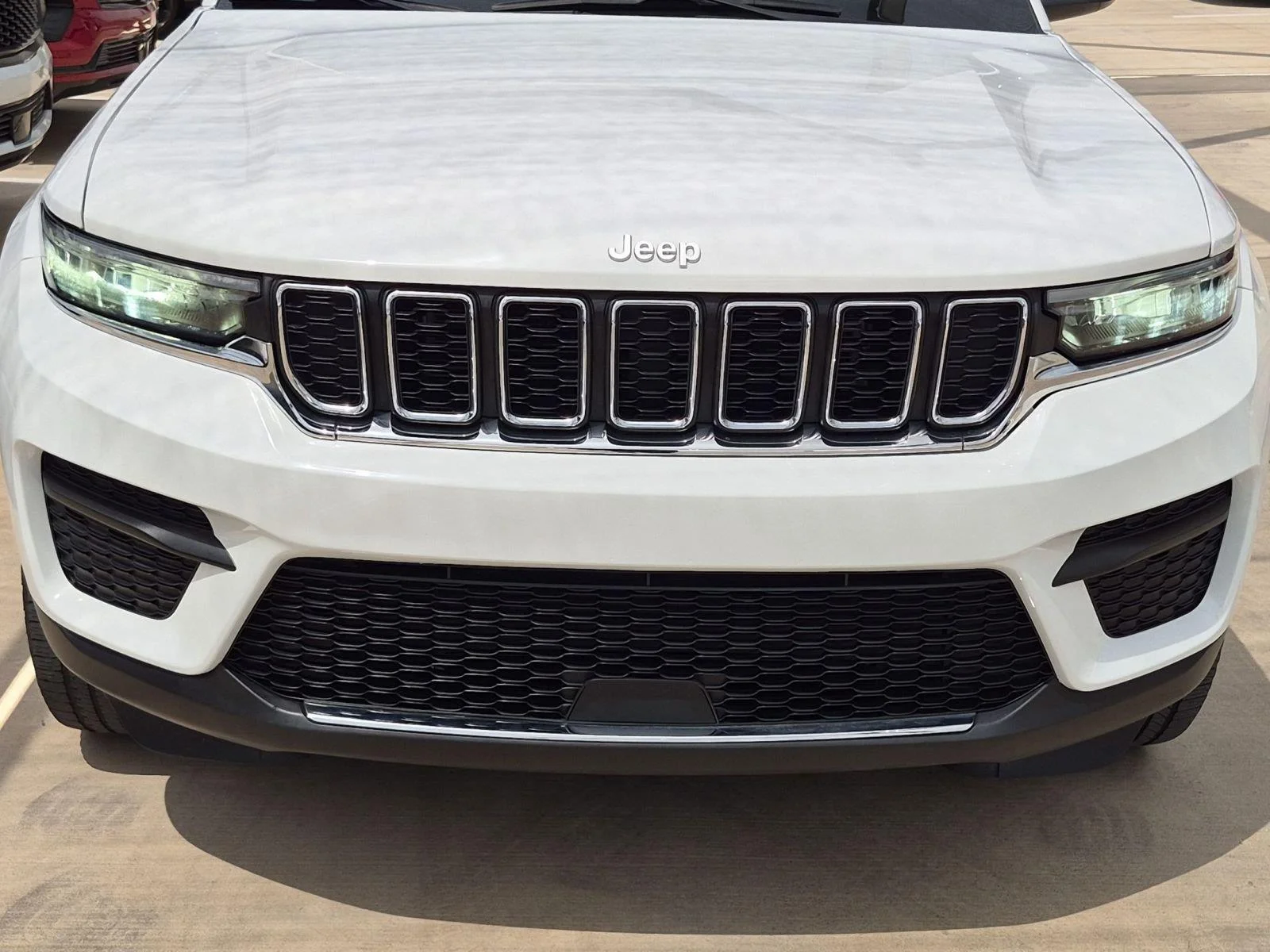 Used 2024 Bright White Clearcoat Jeep Laredo image 6