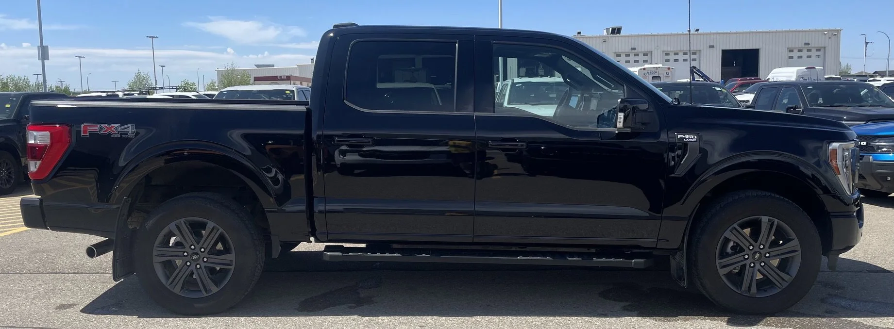 Used 2023 Black Ford LARIAT SuperCrew   **New Arrival** image 6
