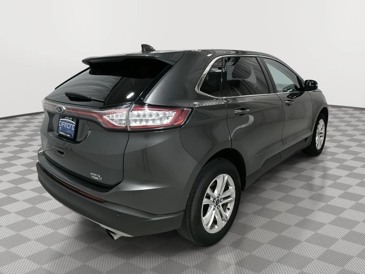Used 2018 Magnetic Metallic Ford SEL image 5