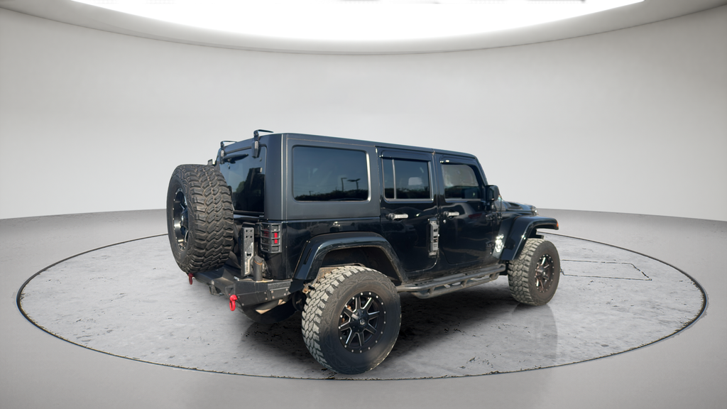 Used 2015 Black Jeep Unlimited Sahara image 5