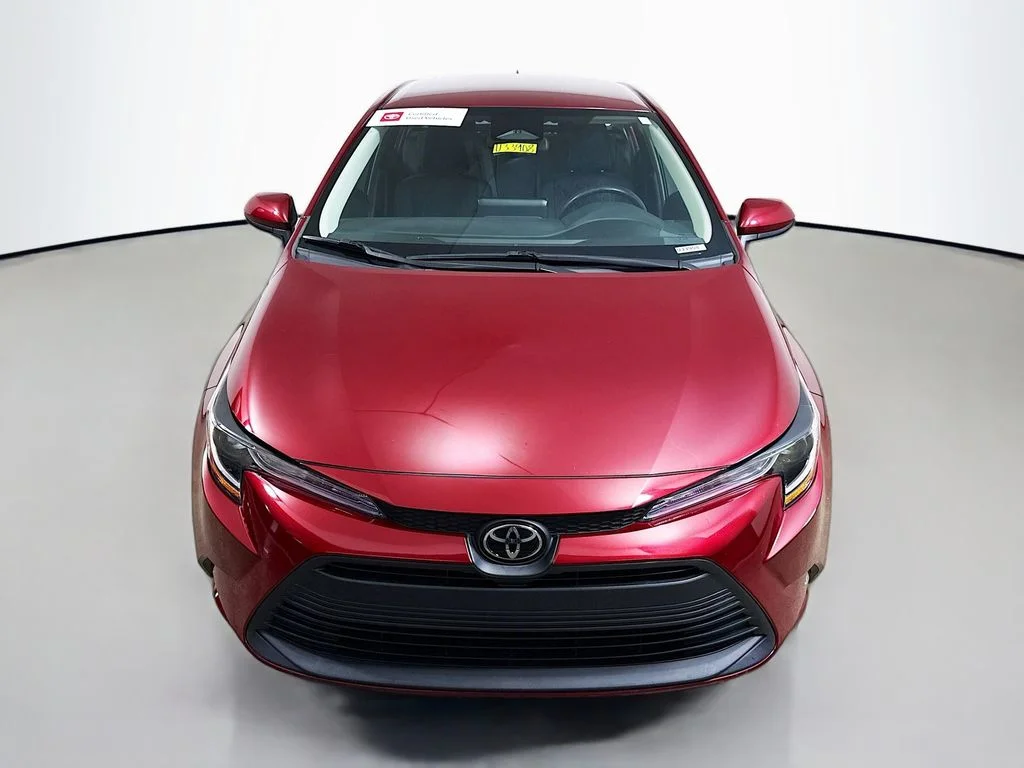 Certified Used 2023 Ruby Flare Pearl Toyota LE image 2