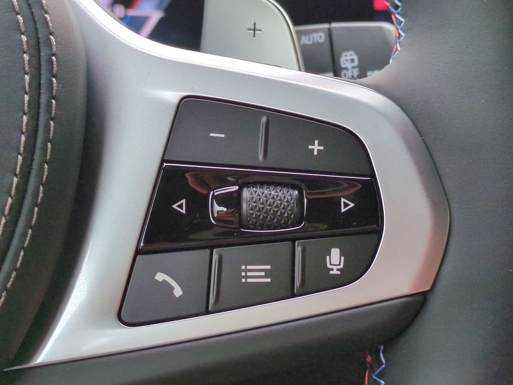 New 2026 Black Sapphire Metallic BMW M60i image 26