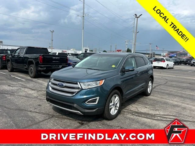Used 2016 Blue Ford SEL image 1