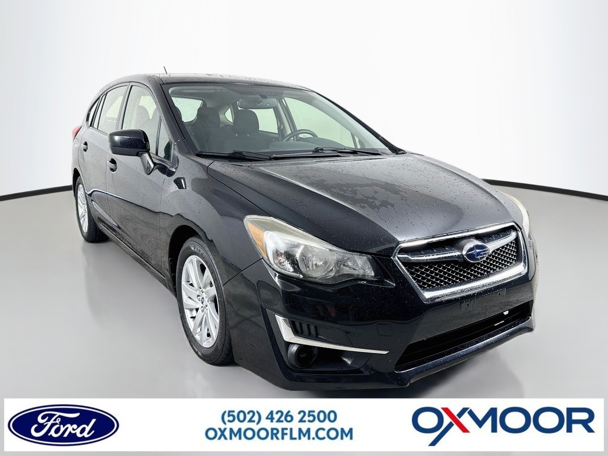 Used 2016 Crystal Black Silica Subaru 2.0i Premium image 1