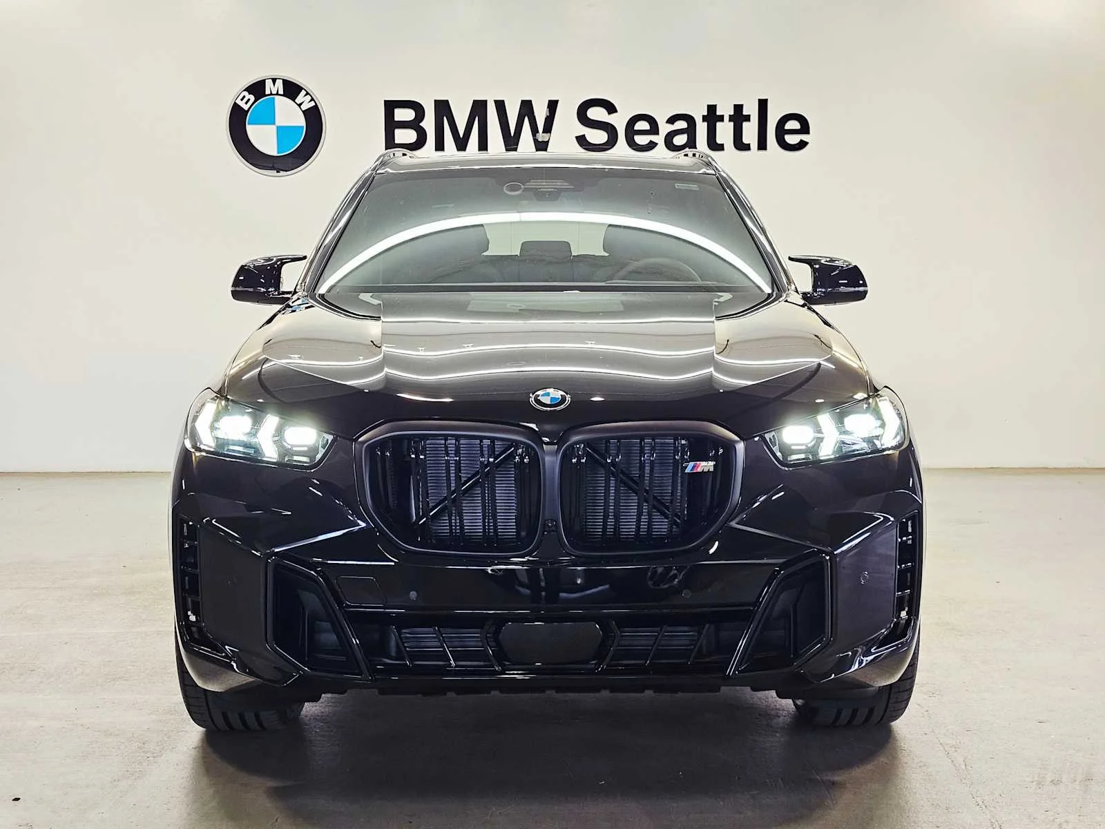 New 2026 Black Sapphire Metallic BMW M60i image 6