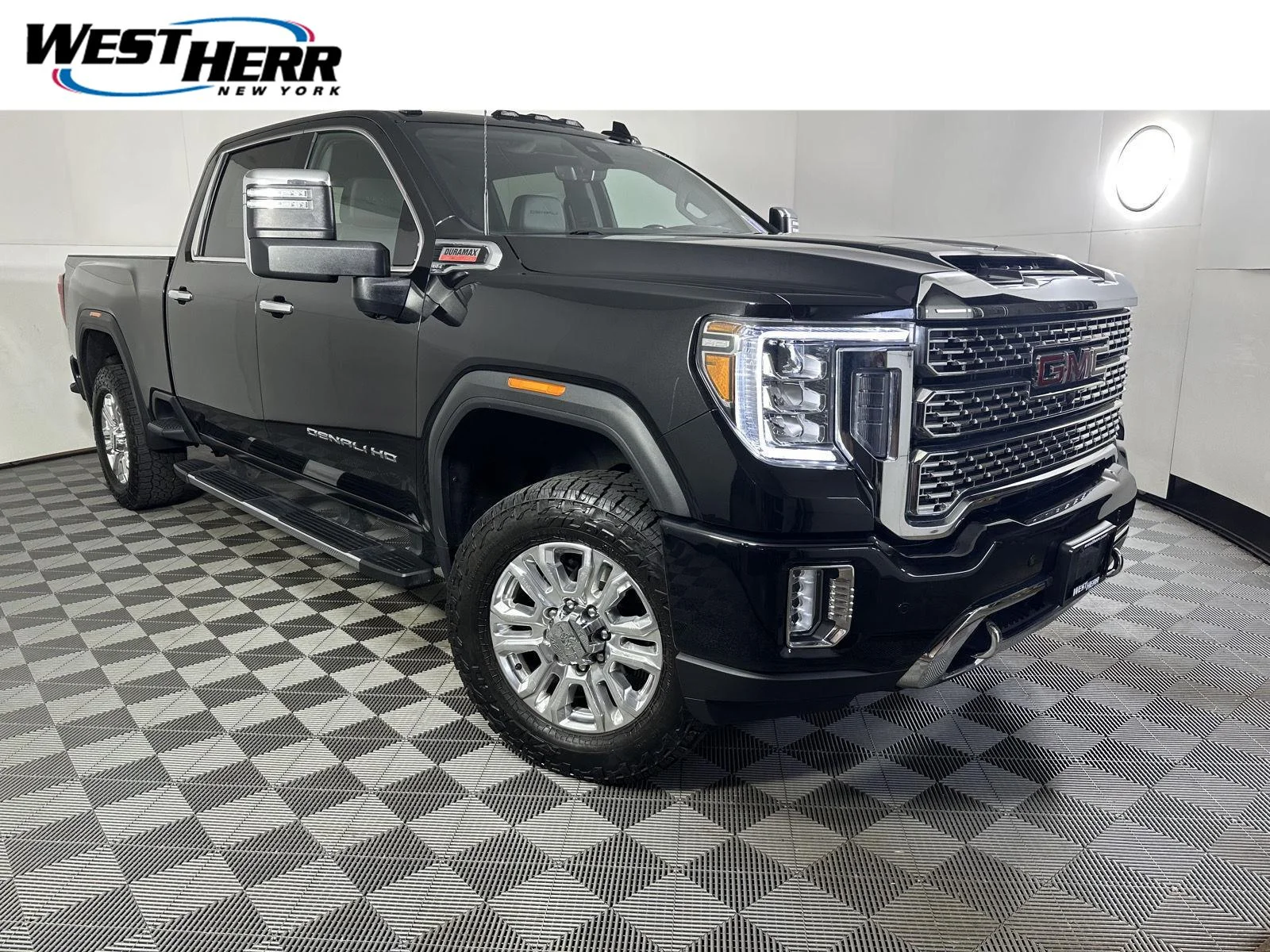 Used 2023 Ebony Twilight Metallic GMC Denali image 1