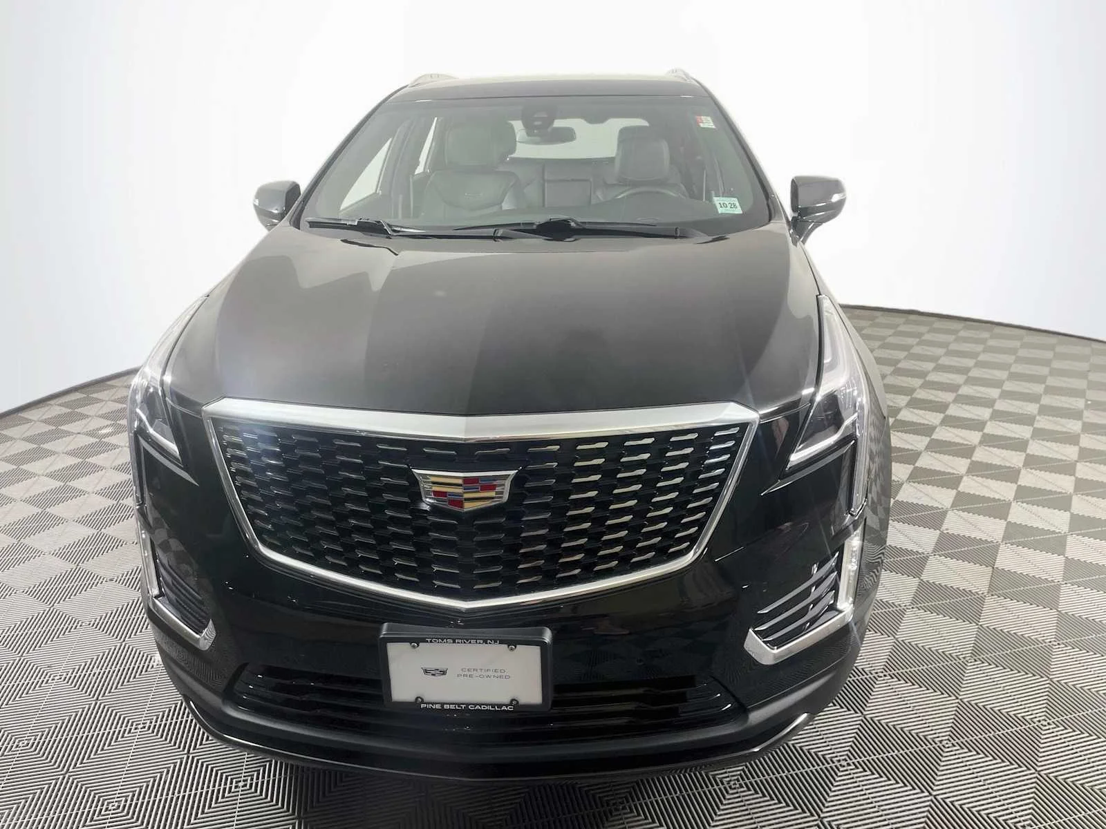Used 2024 Stellar Black Metallic Cadillac FWD Luxury image 2