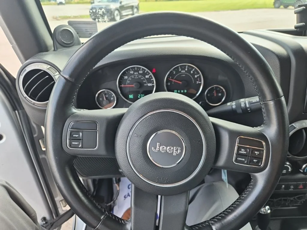 Used 2012 Bright Silver Metallic Jeep Sport image 13