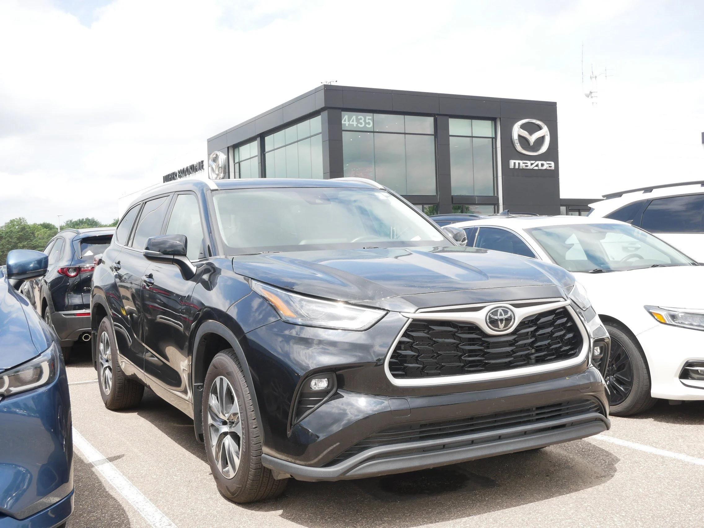Used 2024 Midnight Black Metallic Toyota XLE image 1