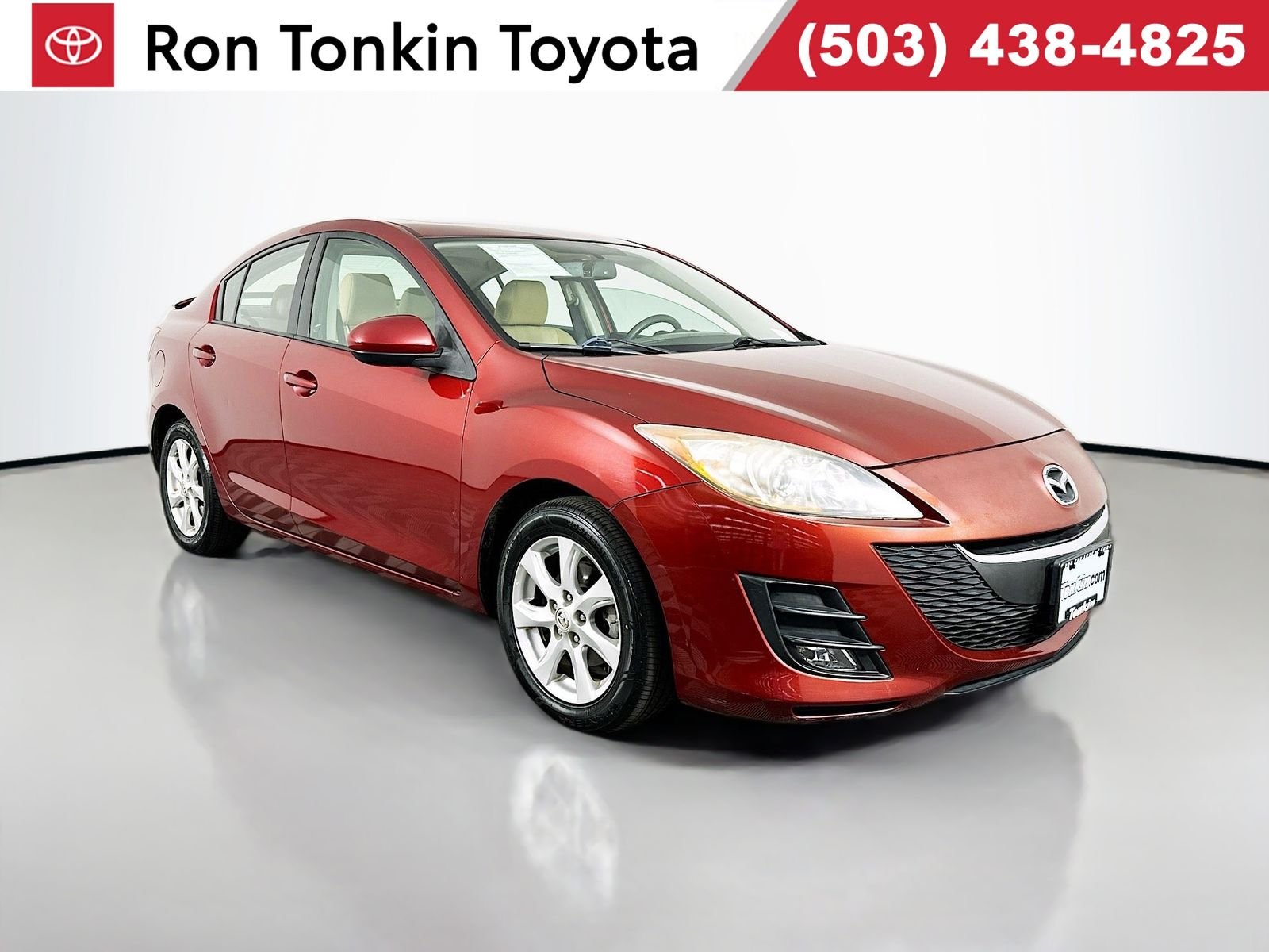 Used 2010 Copper Red Mica Mazda i Touring image 1