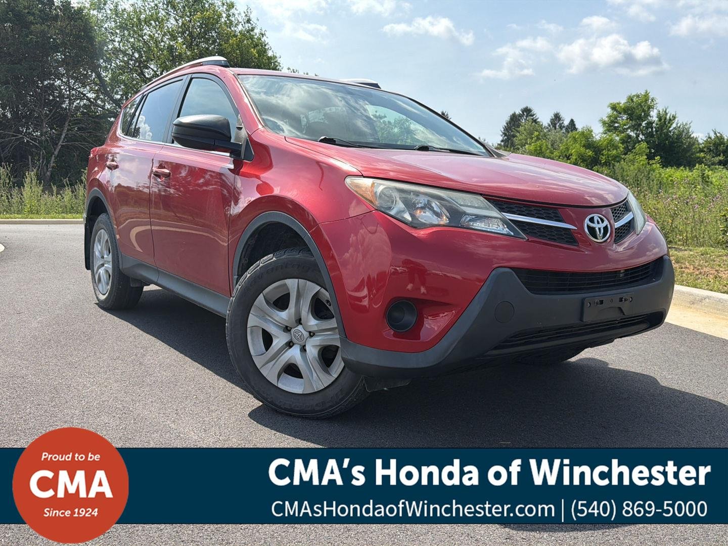 Used 2013 Barcelona Red Metallic Toyota LE image 1