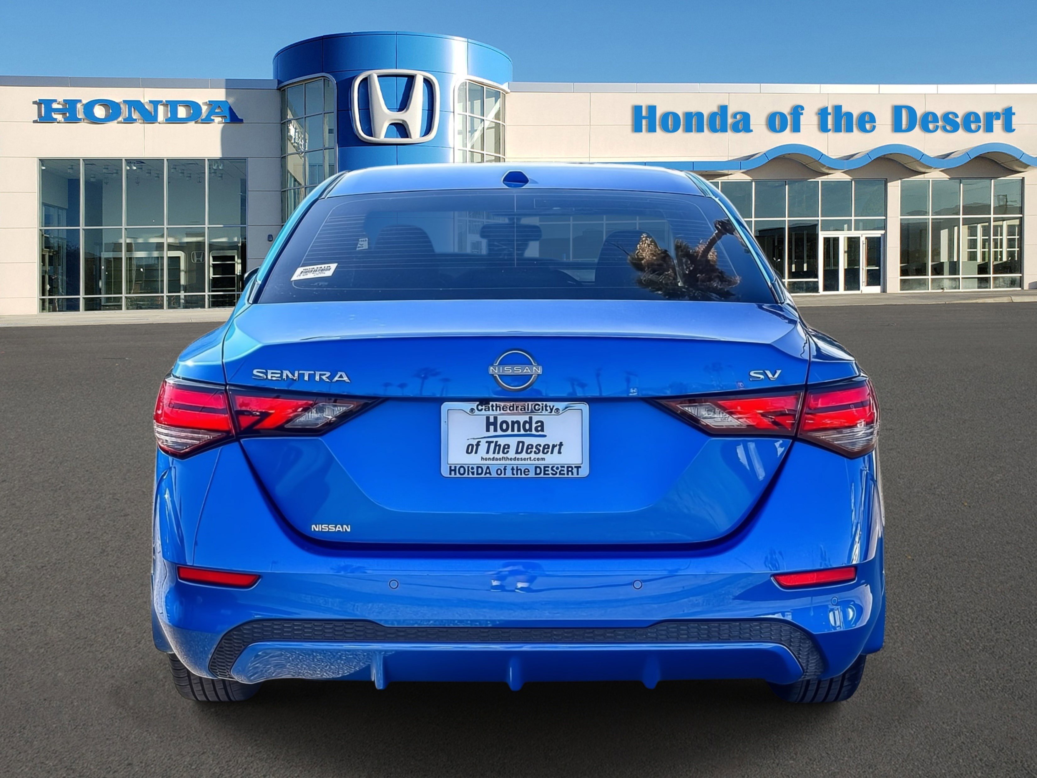 Used 2024 Electric Blue Metallic Nissan SV image 5