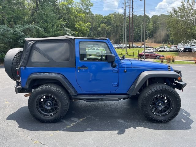 Used 2014 Flame Red Clearcoat Jeep Sport image 8