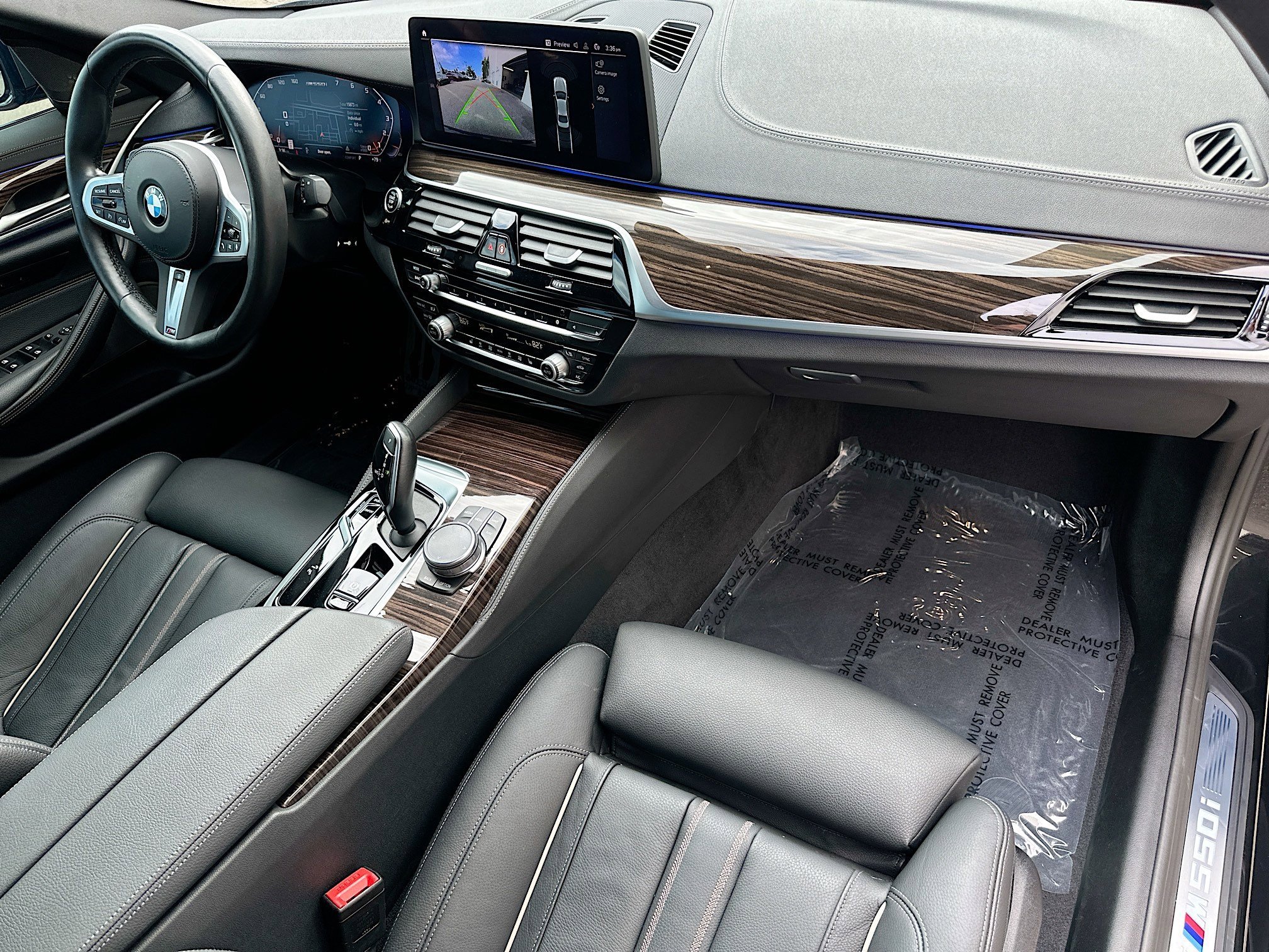Used 2023 Black Sapphire Metallic BMW M550i xDrive image 26