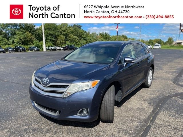 Used 2015 Beige Toyota LE image 1