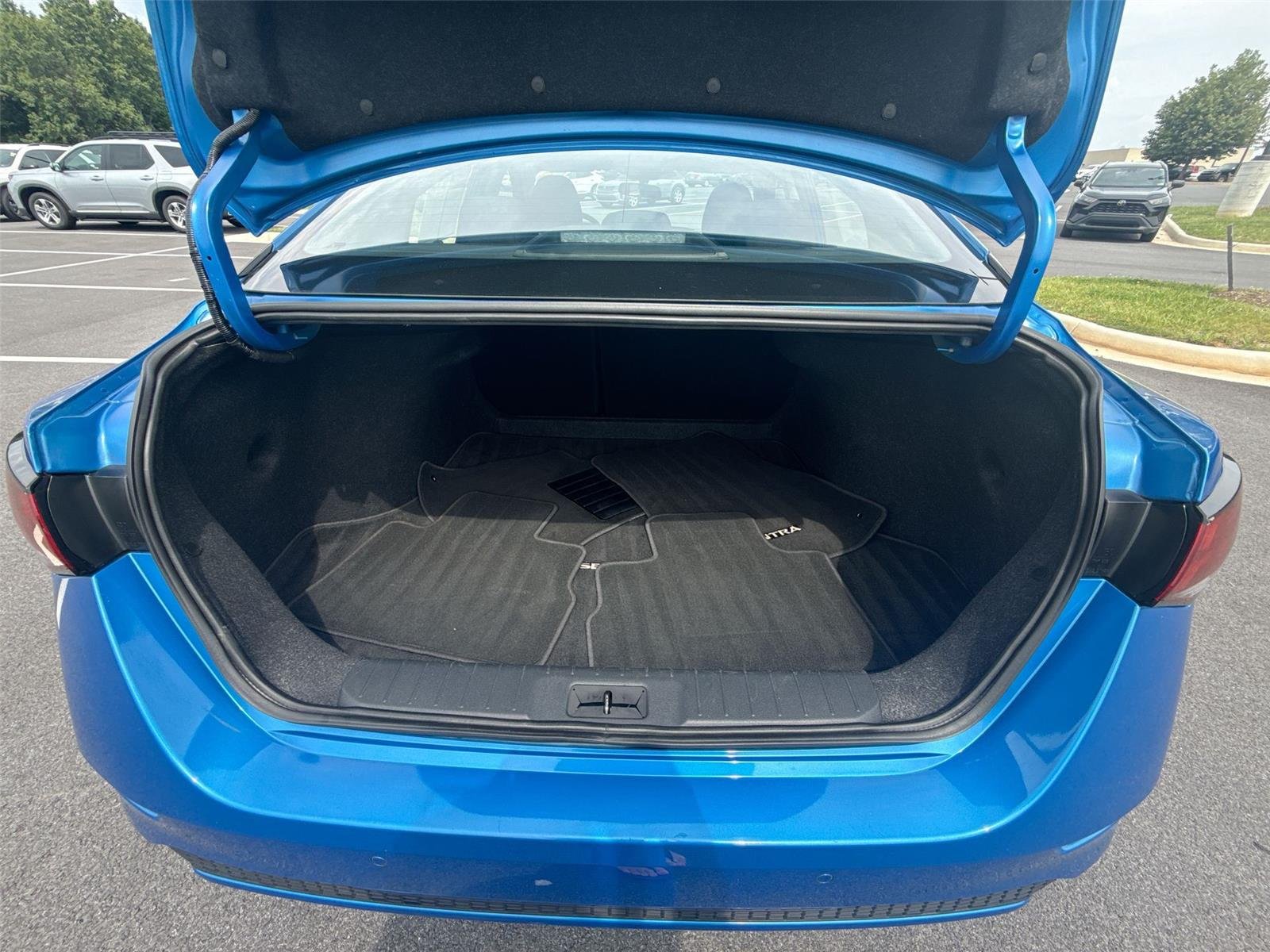 Used 2025 Electric Blue Metallic Nissan SV image 16