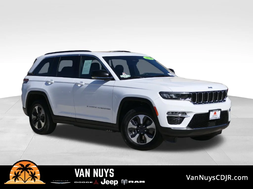 Used 2024 Bright White Clearcoat Jeep 4xe image 1