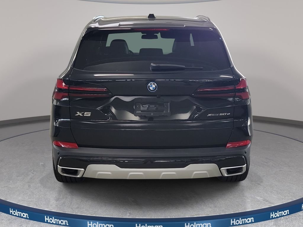 New 2026 Black Sapphire Metallic BMW xDrive50e image 6