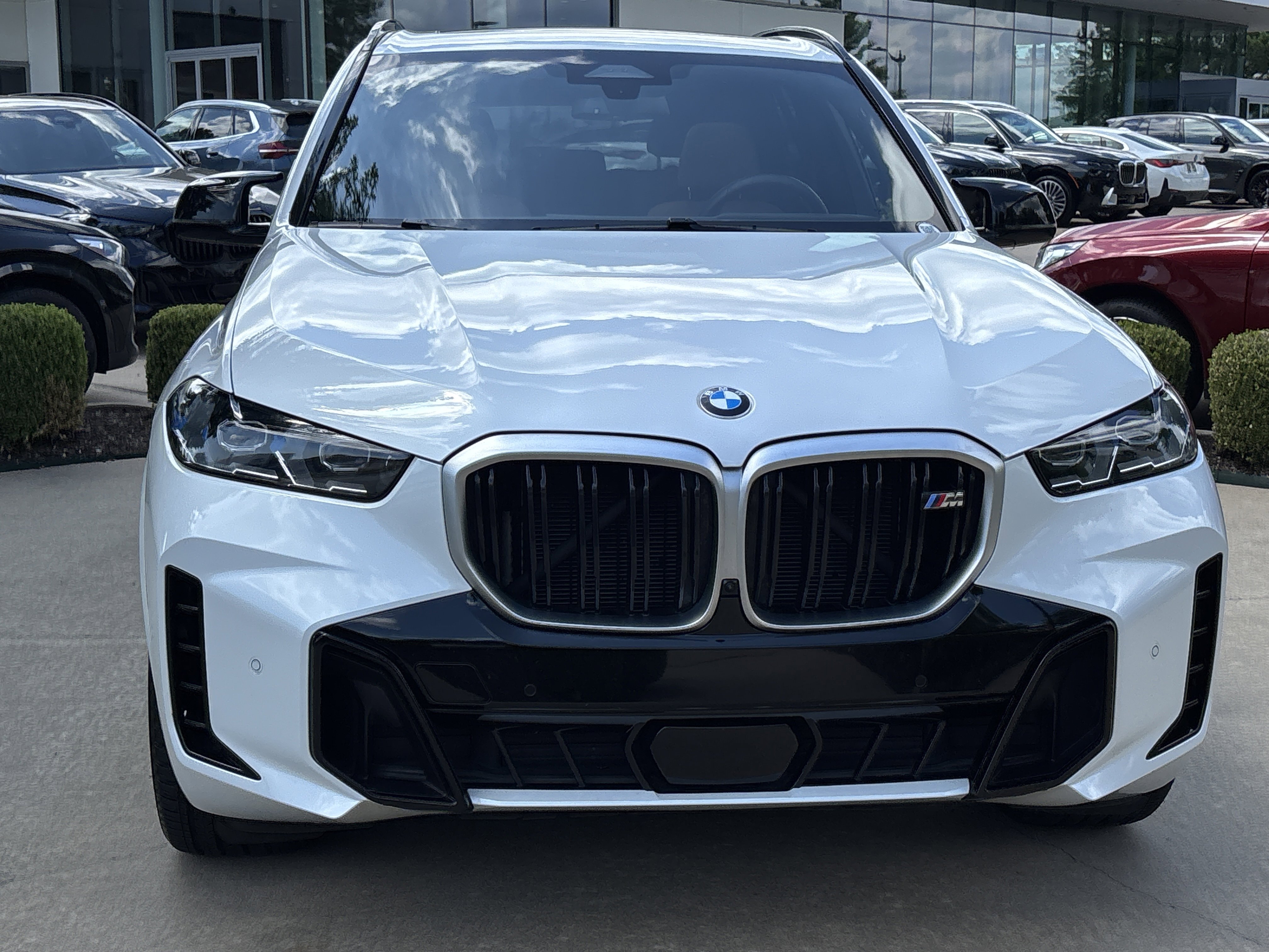 Used 2025 Mineral White Metallic BMW M60i image 13