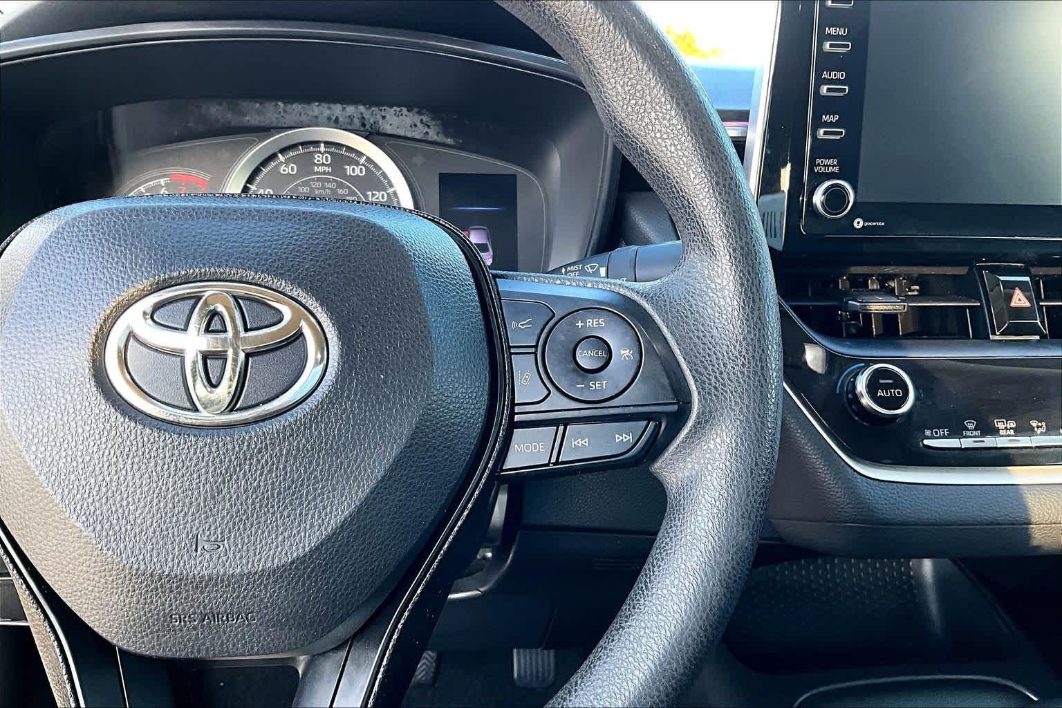 Used 2021 Super White Toyota LE image 25