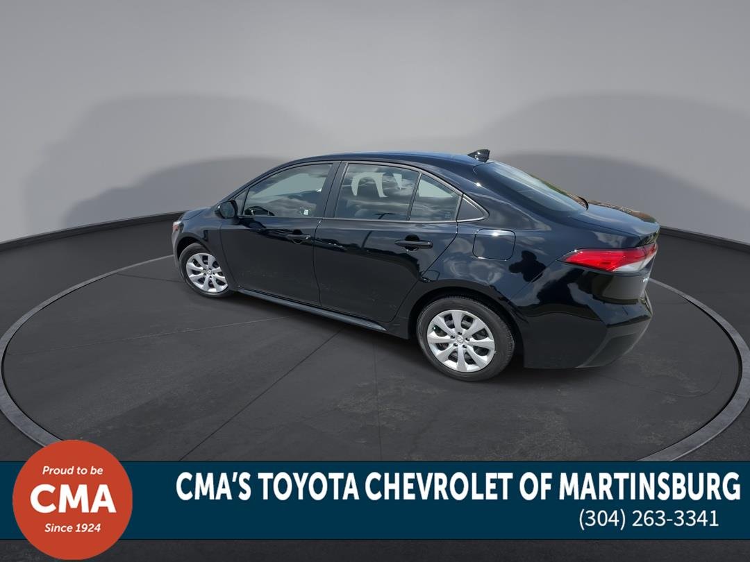 Used 2025 Midnight Black Metallic Toyota Hybrid LE image 6